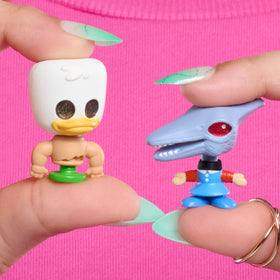 Just Play Disney Doorables Sid's Toy Box Peek figures arranged for playful storytelling and collection