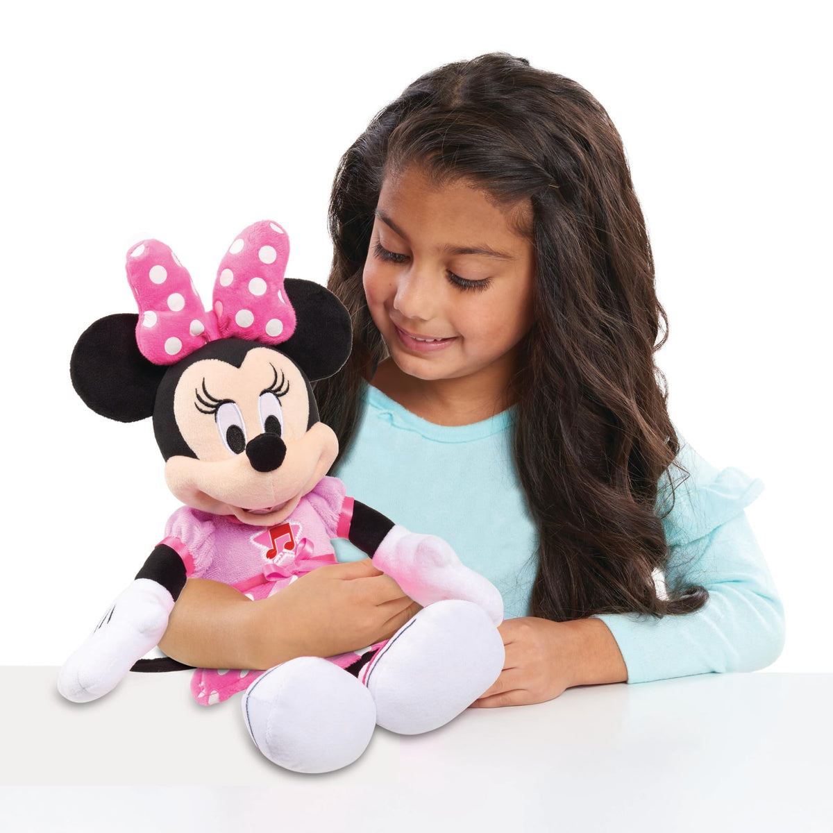 Minnie Mouse sings Bow-Toons with soft fabrics for cuddly playtime.