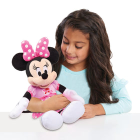Minnie Mouse sings Bow-Toons with soft fabrics for cuddly playtime.