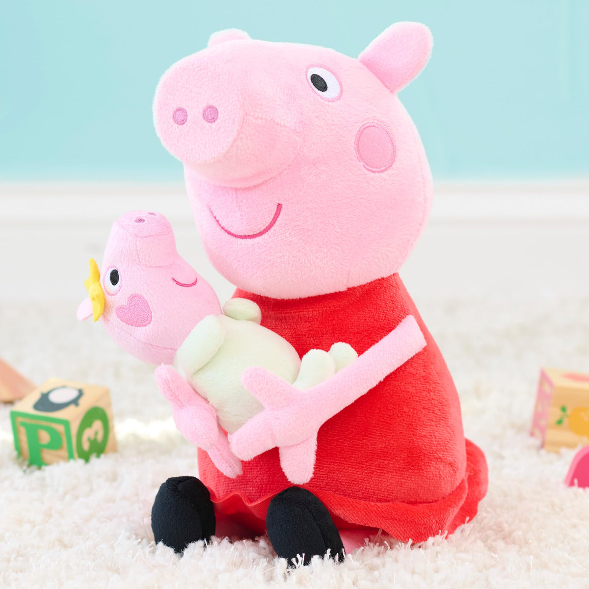 Just Play Peppa Pig Big Sis Plush in a playful pose for adventures