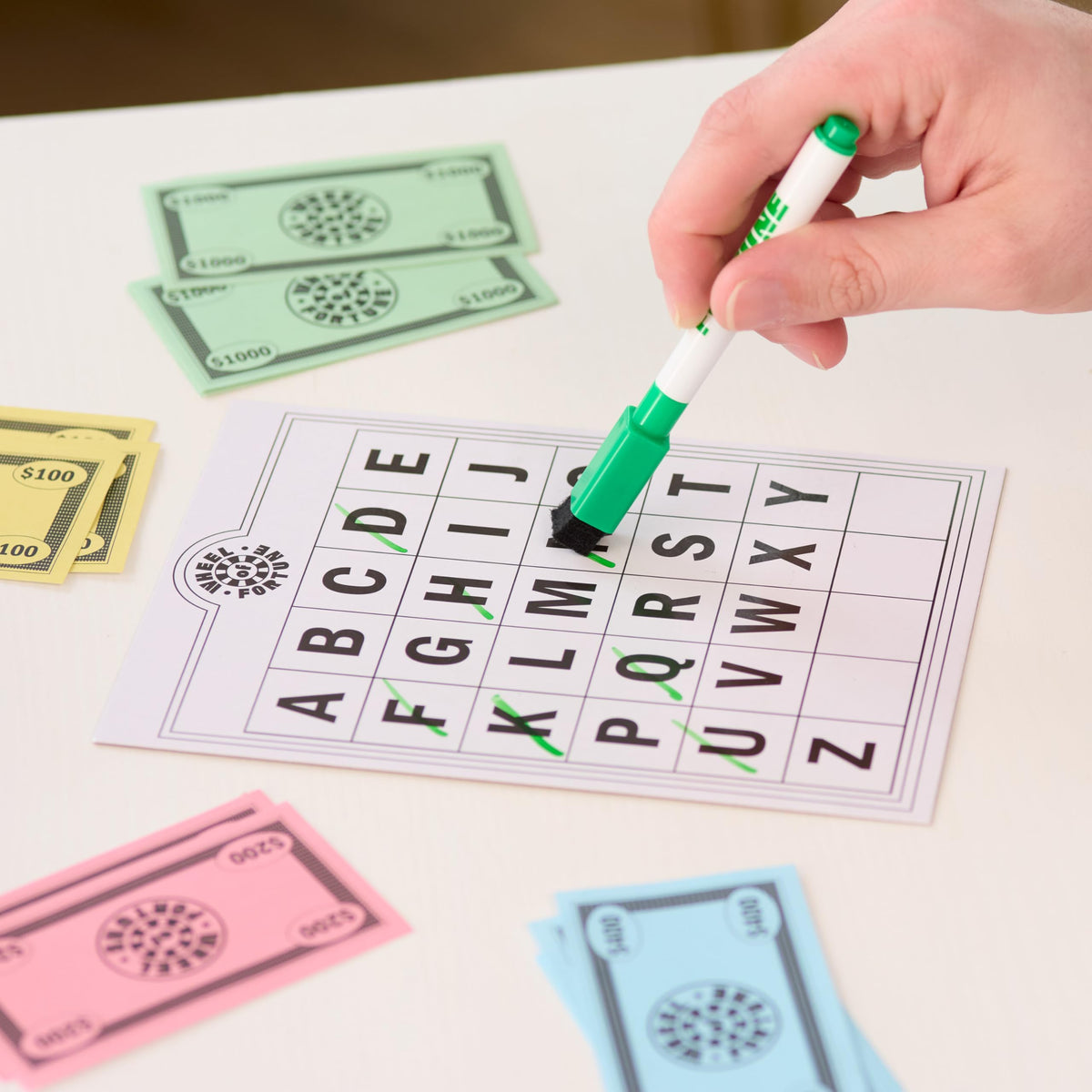Just Play Wheel of Fortune Deluxe Game dry-erase-marker enables fast marking.