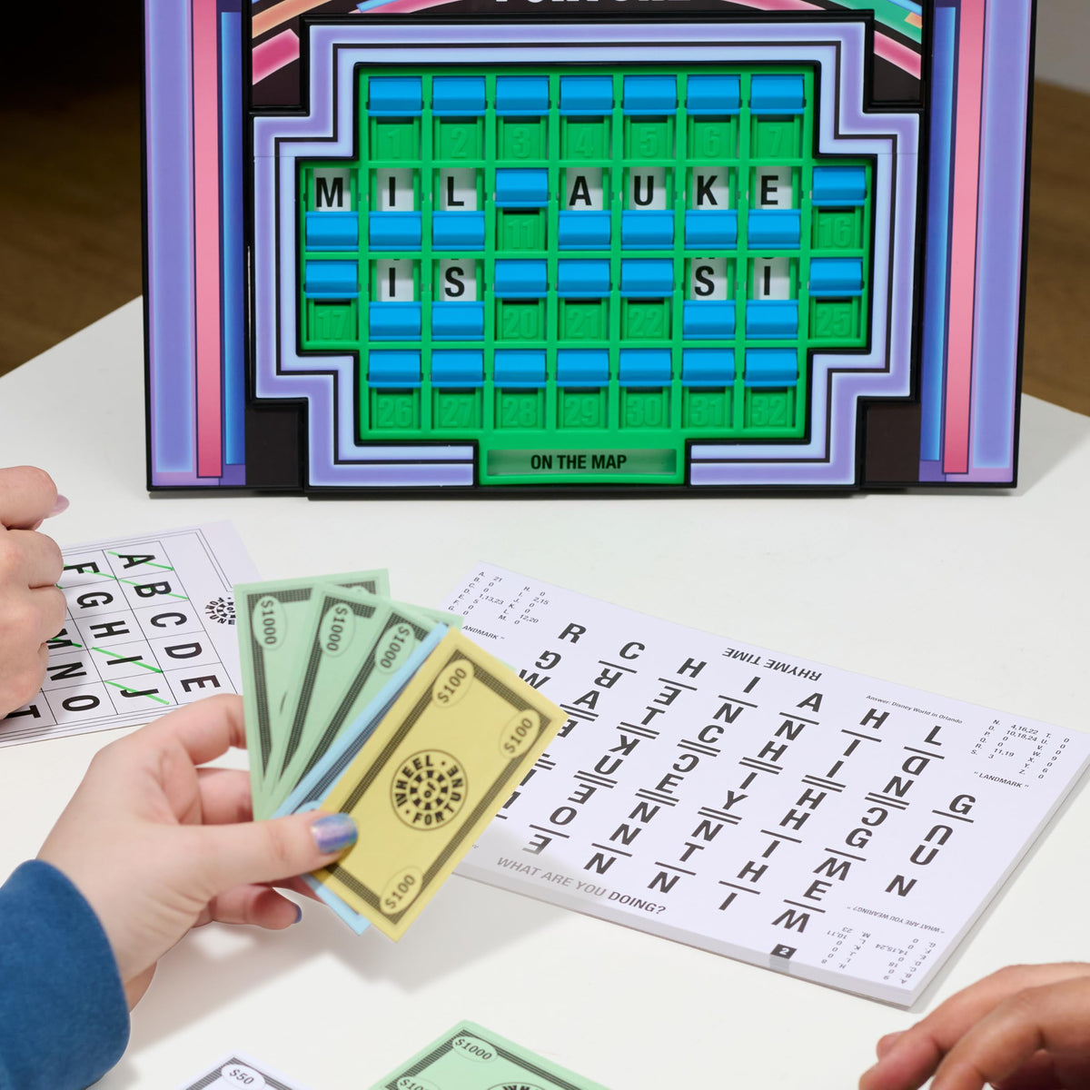 Just Play Wheel of Fortune Deluxe Game instructions guide smooth hosting.