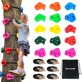 Just.smile climbing holds in a tree set providing a firm, slip-free grip for outdoor play.