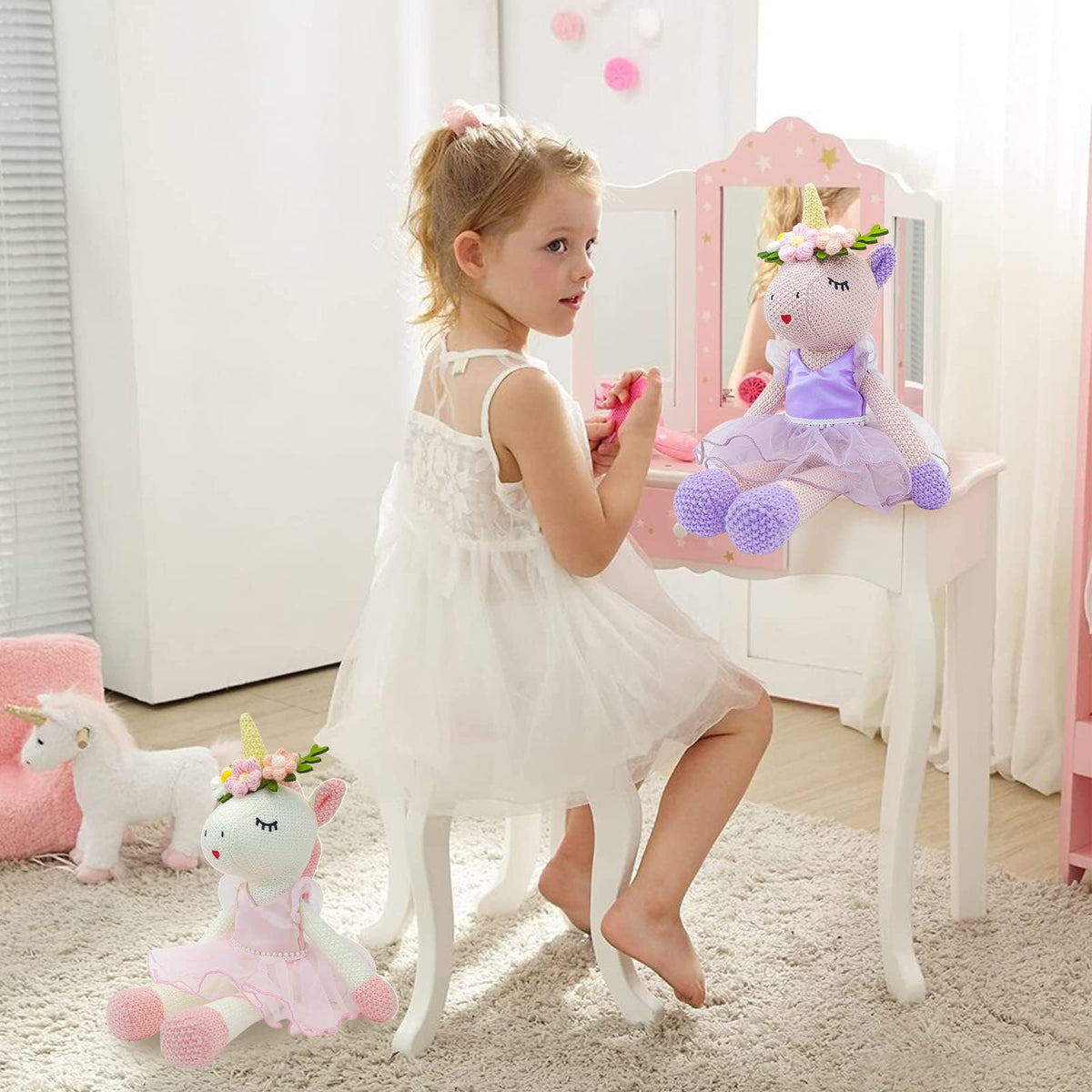 JUSTQUNSEEN pink unicorn plush ready for gifting or display.