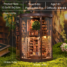 KaayeeWood Wisdom Rings centerpiece nestled among miniature books.