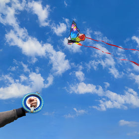 Kaiciuss butterfly kite wings showing lifelike fluttering motion in flight.