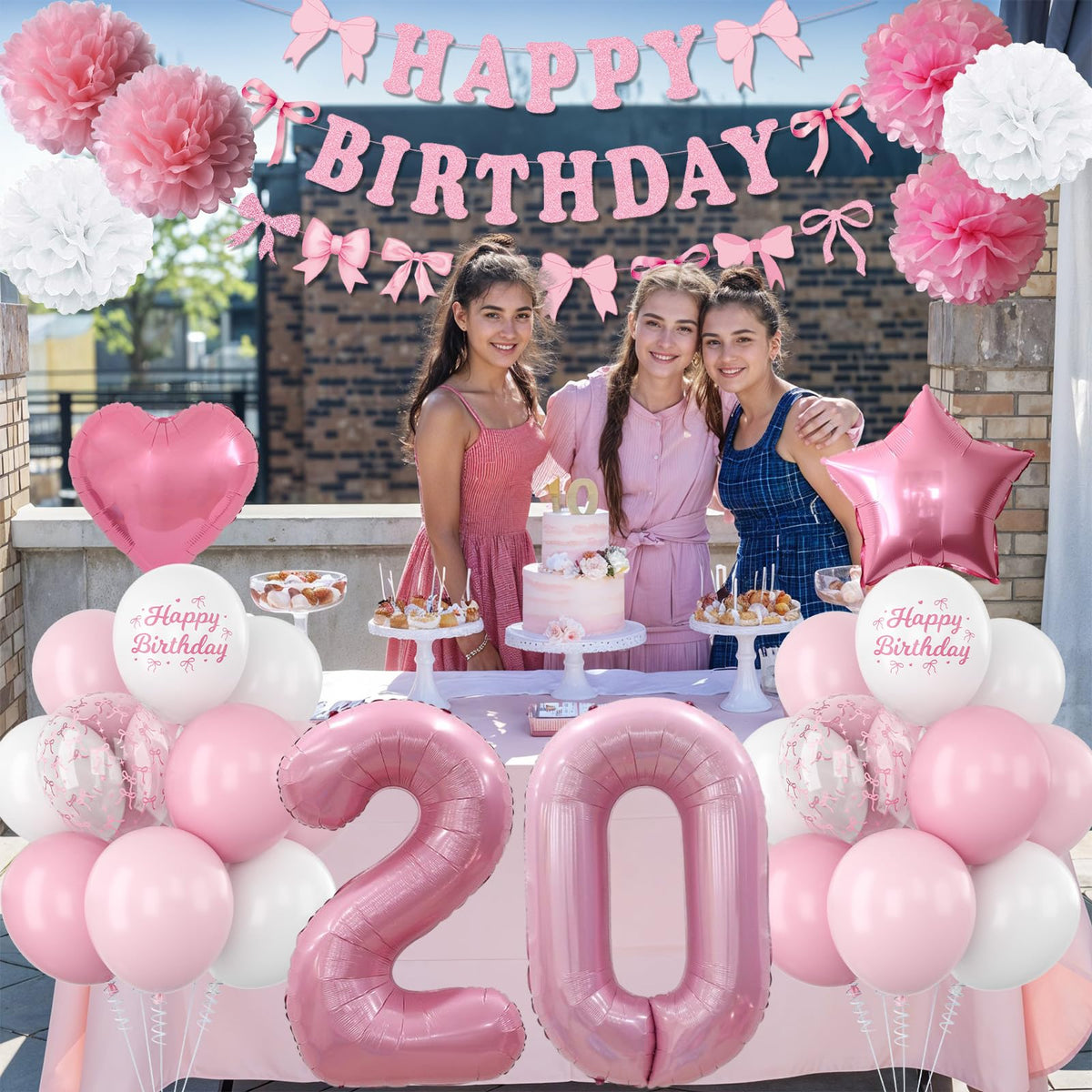 KAINSY pink paper pom poms add soft texture and depth.