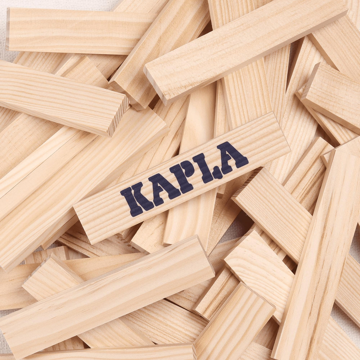 KAPLA planks on table show progress in building unique structures