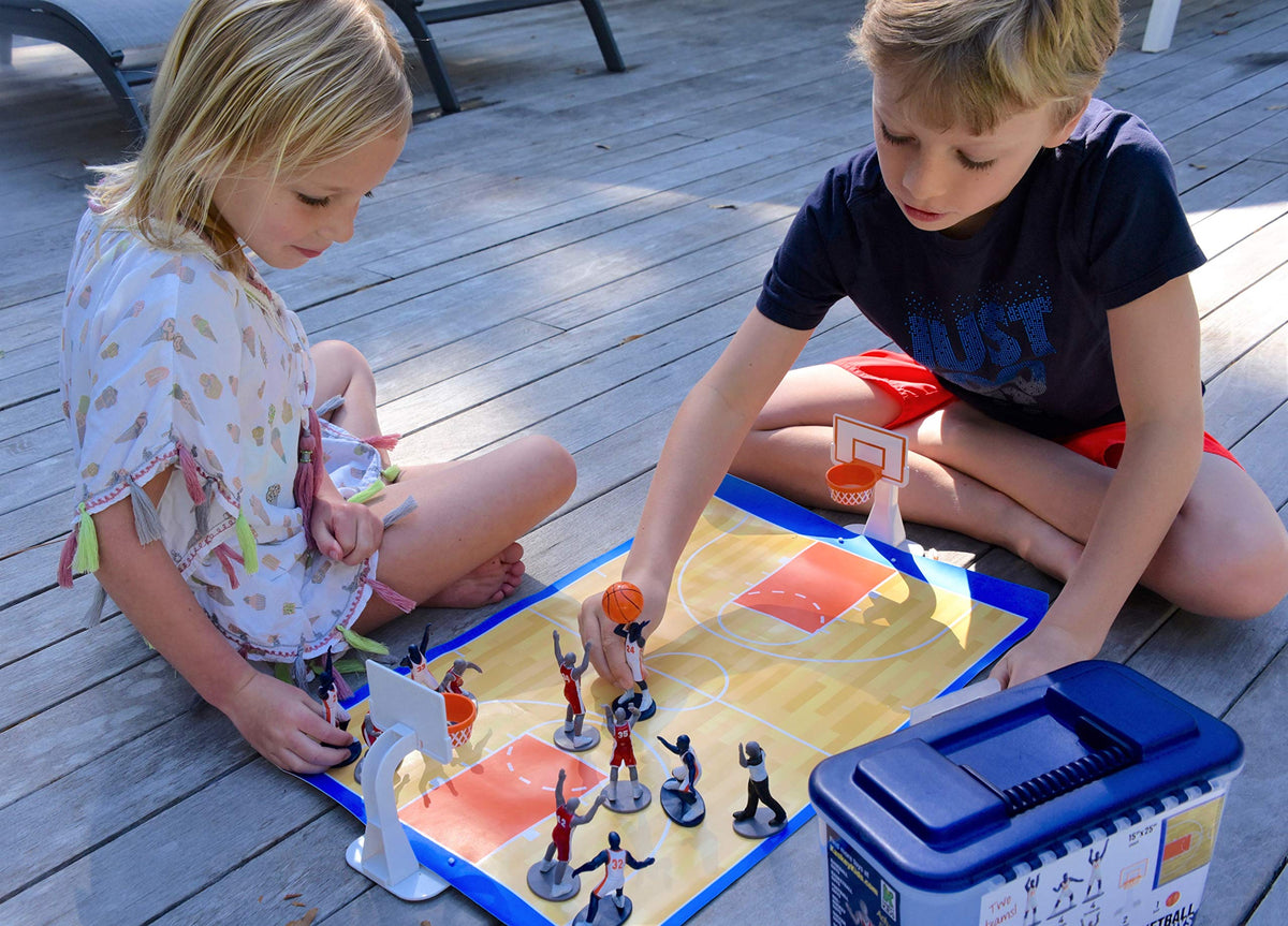 Kaskey Kids Basketball Guys court mat defines play space for action.