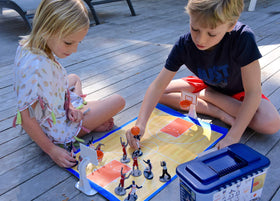 Kaskey Kids Basketball Guys court mat defines play space for action.