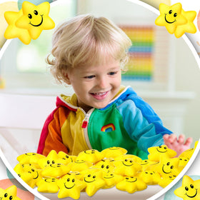 Kasyat star-themed party decor in yellow enhances celebrations.