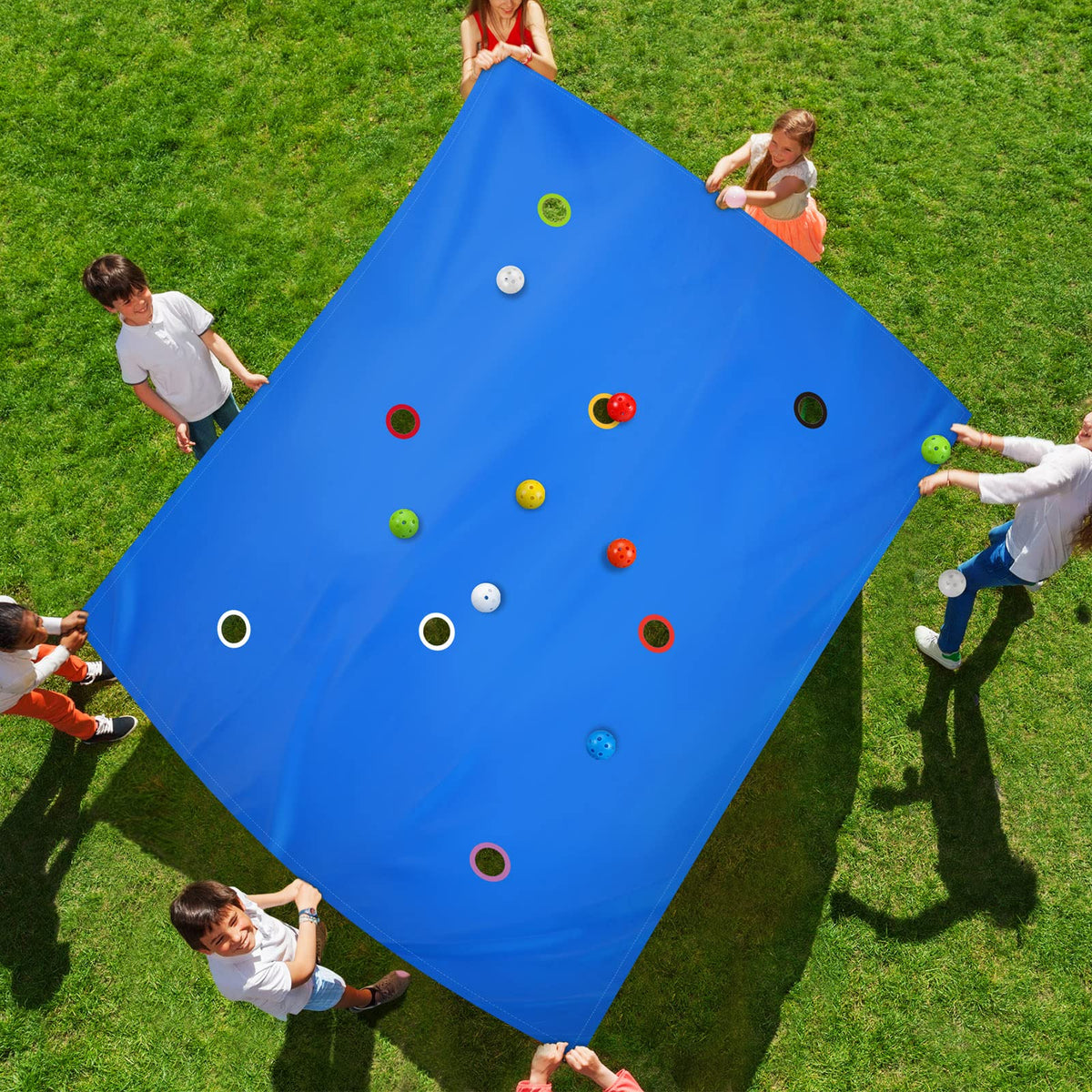 Kathfly blue hole tarp setup for immersive team-building and collaborative play.