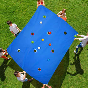 Kathfly blue hole tarp setup for immersive team-building and collaborative play.