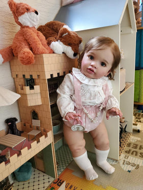 Doll arrives with clothes, magnetic dummy, bottle, and birth certificate