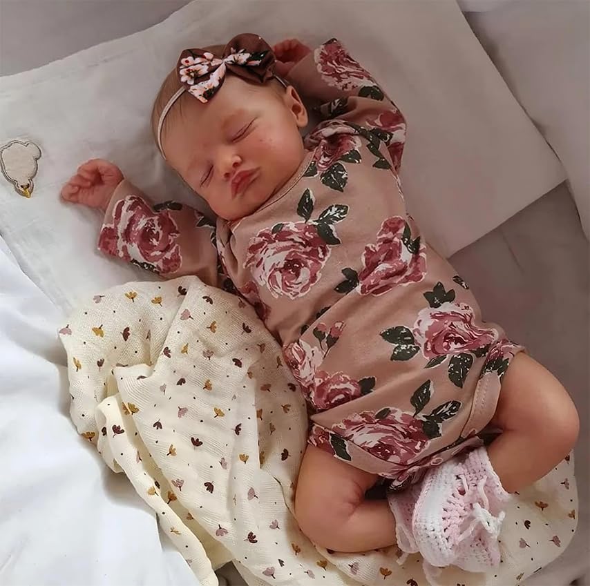 Kaydora 20 inch weighted doll with vinyl head and cloth body