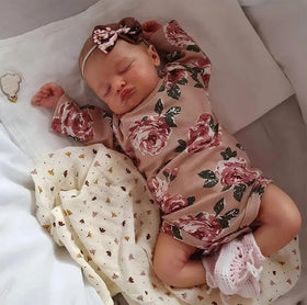 Kaydora 20 inch weighted doll with vinyl head and cloth body