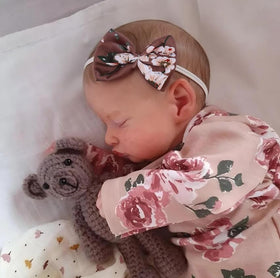Kaydora doll shows veins and weighted limbs for realism