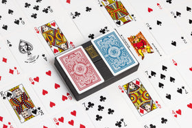 KEM Arrow bridge-size cards with comfortable grip for extended play.