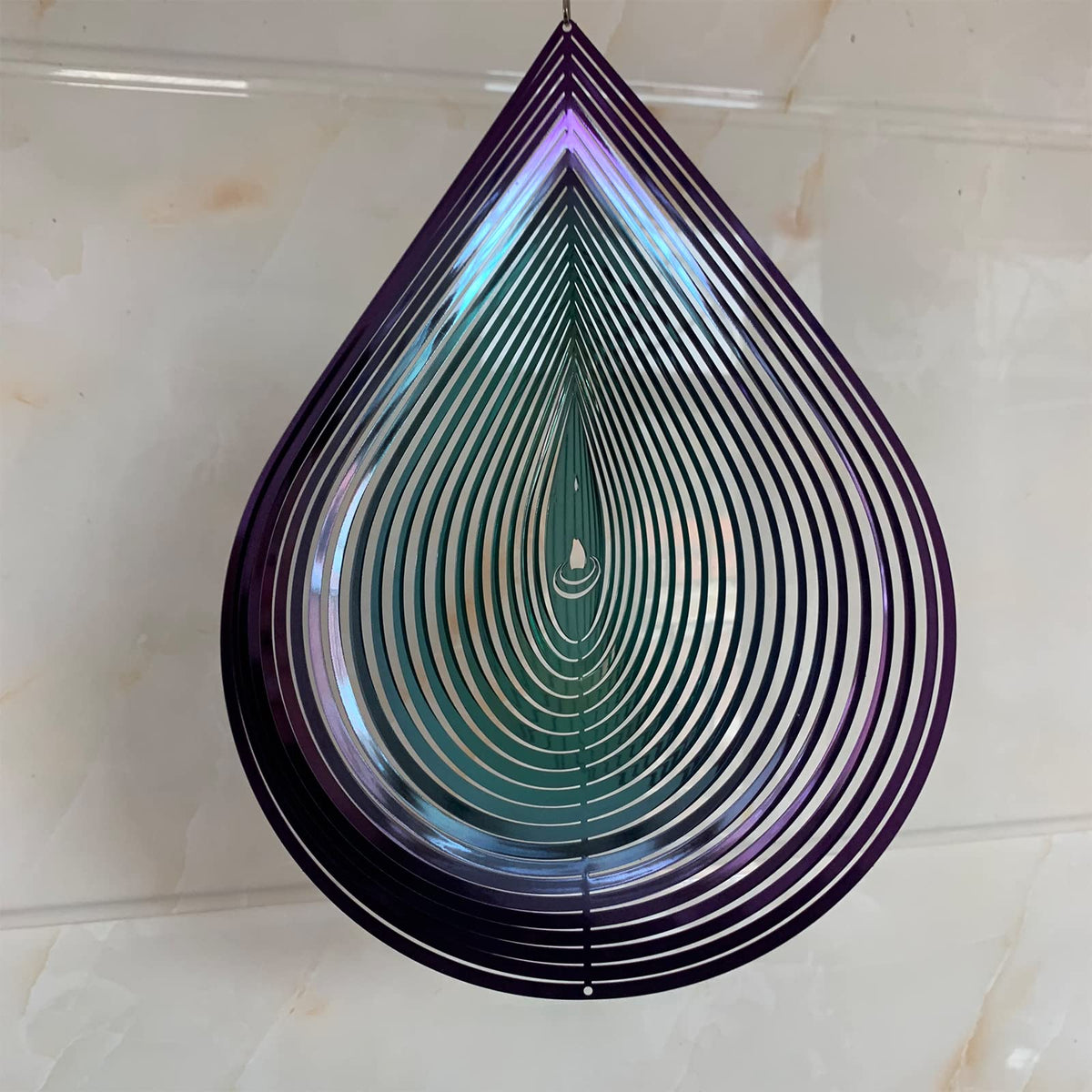 Kexsscai stainless steel 3D wind spinner design catches light and spins gracefully.