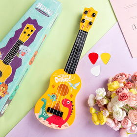 KFPPLXQ mini guitar dinosaur packaging, gift-ready for birthdays or holidays.