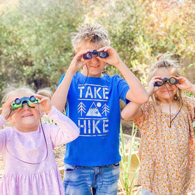 Spy party vibe with Kicko binoculars fueling adventurous play.