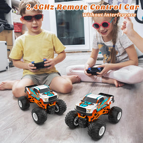 Kidcia 1:16 RC Monster Truck on rugged terrain showing oversized tires.
