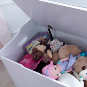 KidKraft Austin toy box bench storage inside, blankets, books, and plush toys neatly organized.