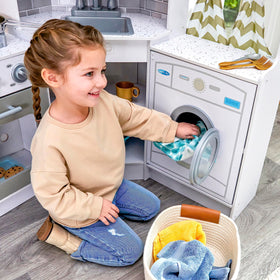 KidKraft Built-in storage shelves, helps organize kitchen accessories.