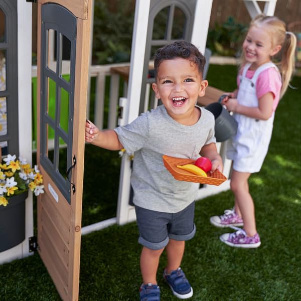 Fringe pet door of KidKraft Lantana Lane adds secret entry for friends