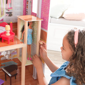 KidKraft Majestic Mansion elevator in operation enhances interactive exploration between floors