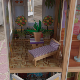KidKraft Majestic Mansion with pet cat bed adds homey detail for dolls