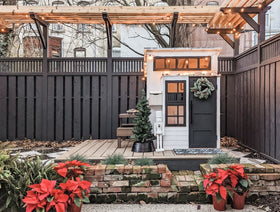 KidKraft white curtains add cozy home-like touch to outdoor play.