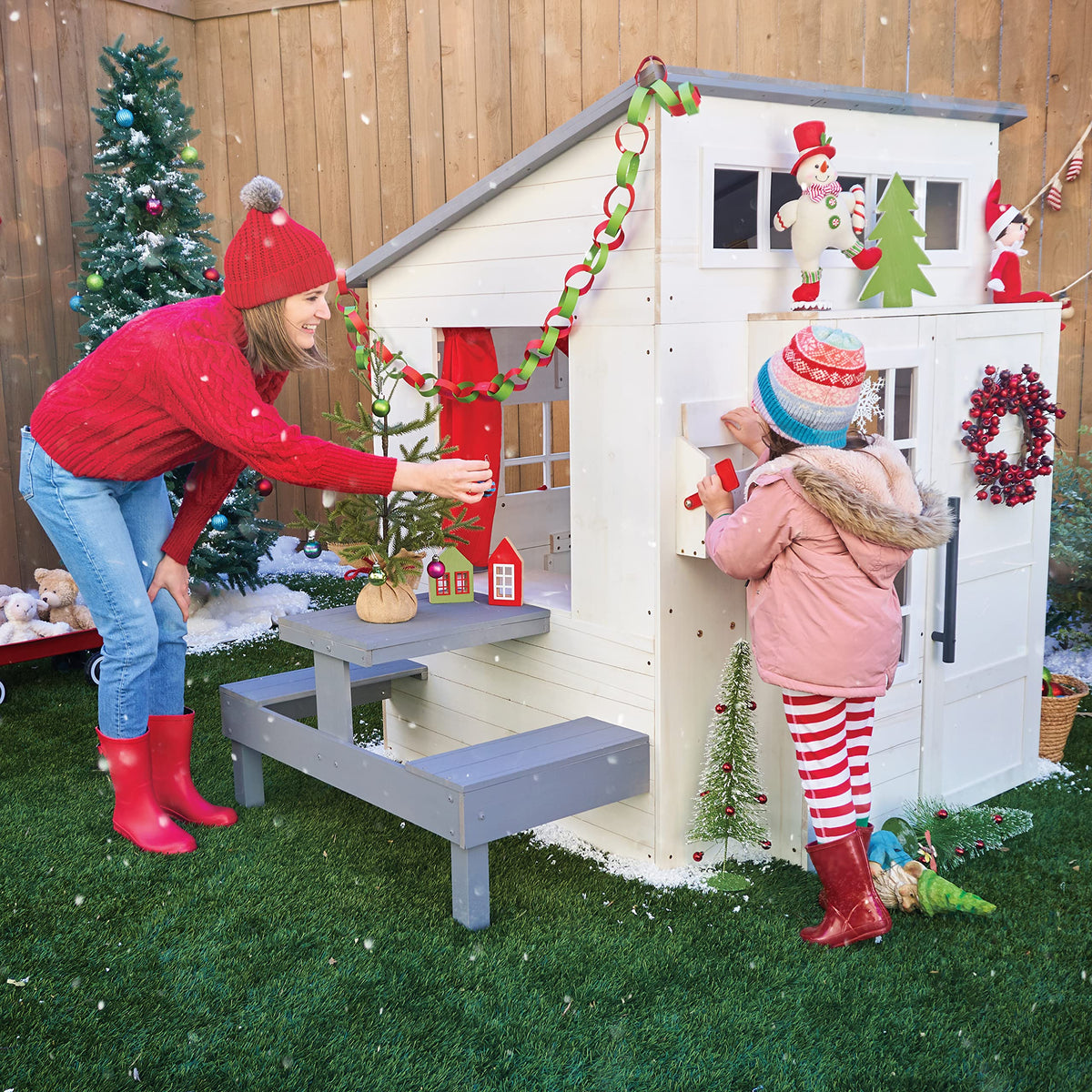KidKraft outdoor playhouse white kitchen grill for pretend meals.