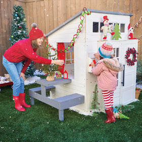 KidKraft outdoor playhouse white kitchen grill for pretend meals.
