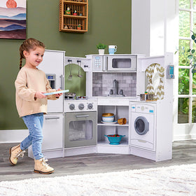KidKraft with lights and sounds on stovetop, engaging sensory cooking experiences.
