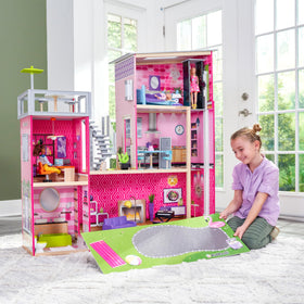 KidKraft Uptown Dollhouse includes 36 accessories for complete play setups.