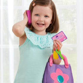 Kidoozie My First Purse includes wallet and pretend card for roleplay.