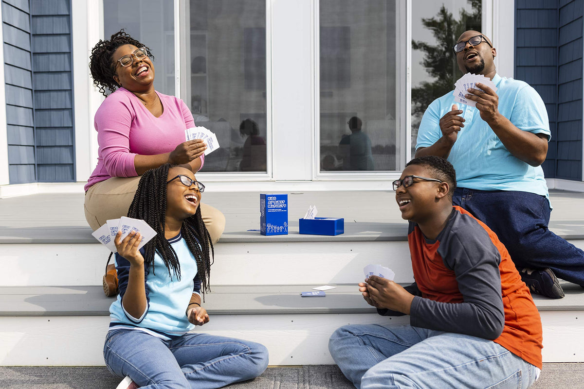 Kids Against Maturity play promo scene highlighting family laughter and togetherness