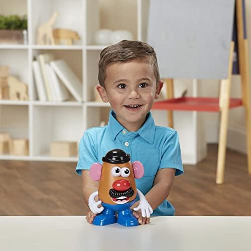 Kids hands playing with Mr Potato Head for creative, hands-on fun.