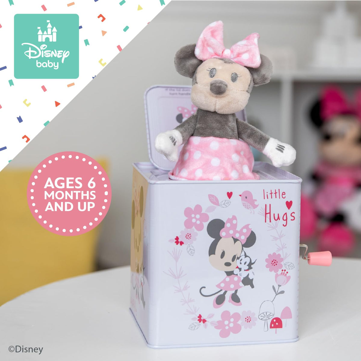 Baby playtime moment with Minnie jack-in-the-box suitable for curious infants