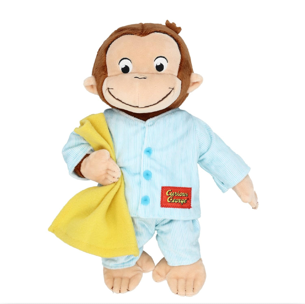 Kids Preferred Curious George in Pajamas plush sits with a cozy blanket for bedtime comfort.