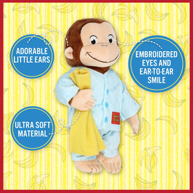 Soft fur and button details on Curious George in Pajamas plush for nap time.