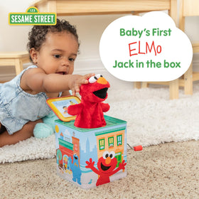 Elmo soft plush puppet inside the box for cuddly, gentle play.