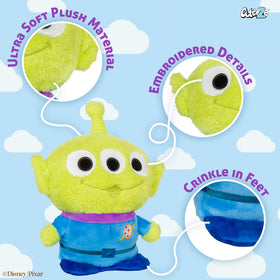 Embroidered three-eyed face of the Little Green Man plush.