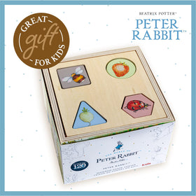 KIDS PREFERRED sorter in action helps little ones match shapes and openings.
