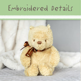 Kids Preferred Pooh bear plush ribbon detail adds classic charm