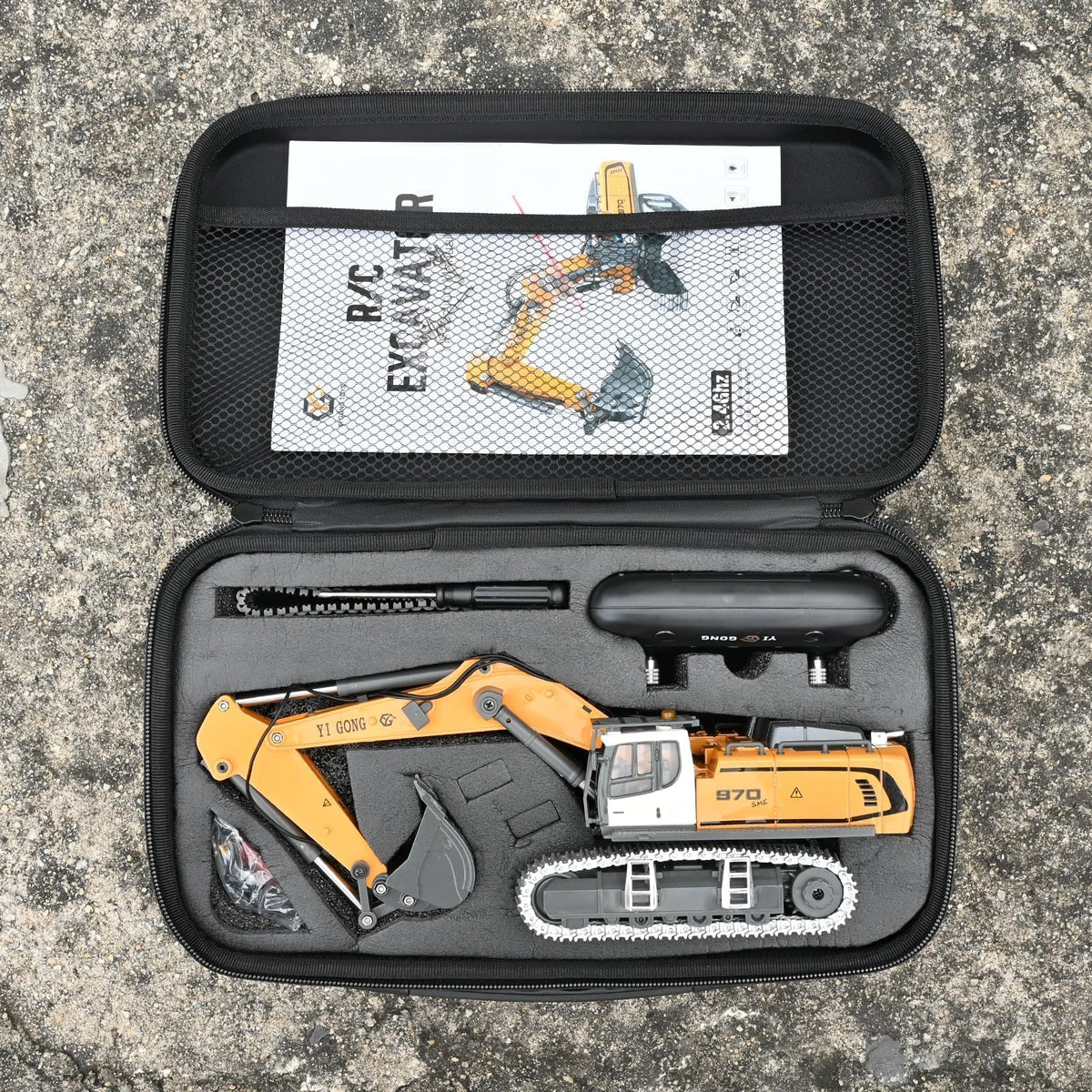 KidsFaves Pro-Grade RC Excavator remote-battery setup supports longer play sessions.