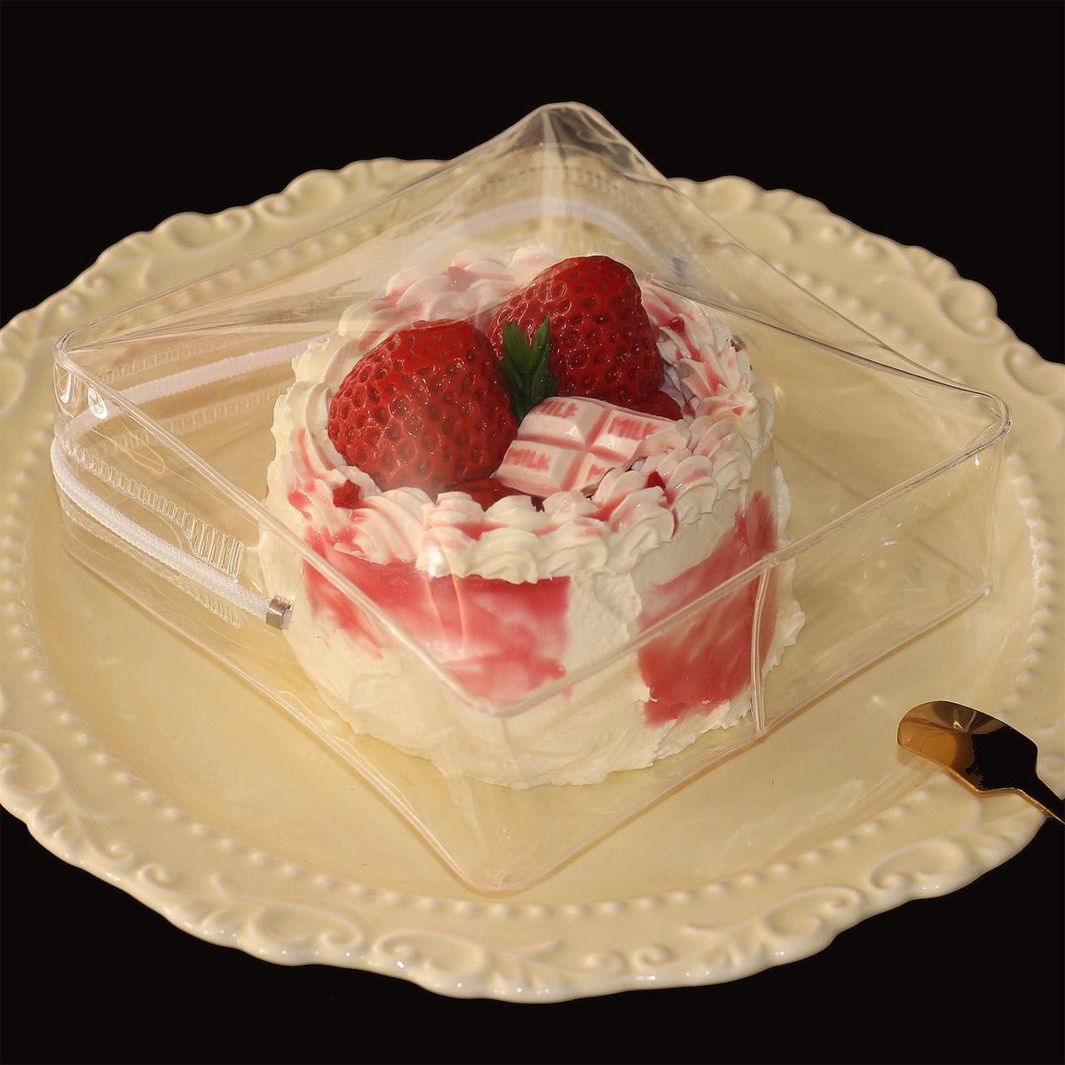 KILOSTEP Strawberry Cream Cake inside an extra-soft bag for clean, tactile play