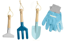 Kinderific Camo Quest fork assists gentle soil turning during kid-friendly gardening.