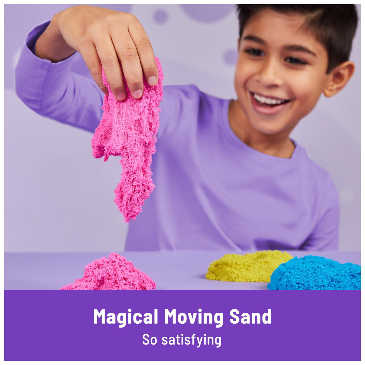 Kinetic Sand flow fork demonstrating color layering and flow.
